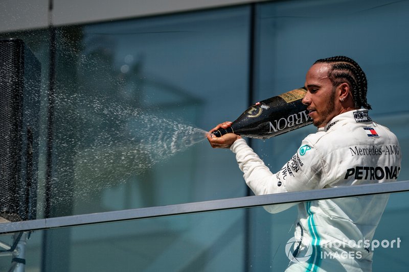 Lewis Hamilton, Mercedes AMG F1, 1st position, sprays Champagne on the podium