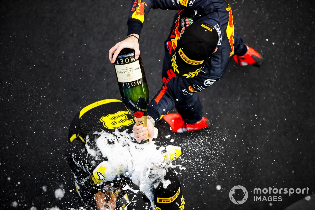 Daniel Ricciardo, Renault F1 and Max Verstappen, Red Bull Racing celebrates on the podium with the champagne