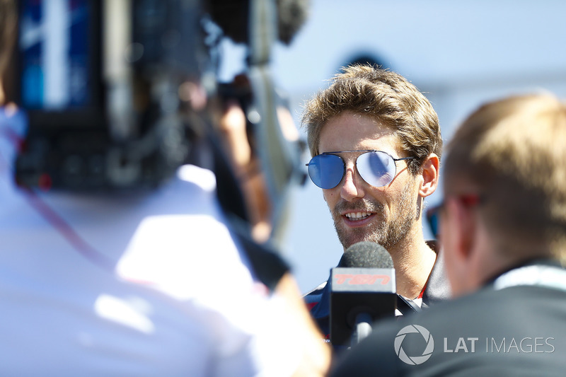 Romain Grosjean, Haas F1 Team, talks to the media in qualifying