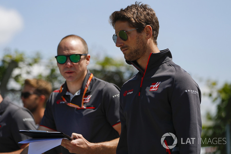 Romain Grosjean, Haas F1 Team, conducts a track walk with colleagues