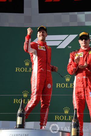 Race winner Sebastian Vettel, Ferrari celebrates on the podium