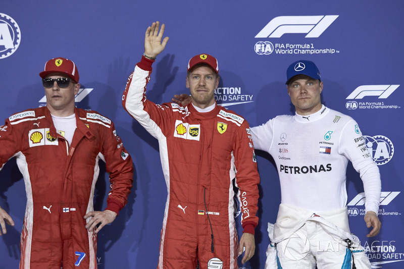 Top three qualifiers Sebastian Vettel, Ferrari, Kimi Raikkonen, Ferrari, and Valtteri Bottas, Mercedes AMG F1