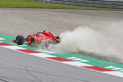 Kimi Raikkonen, Ferrari SF71H, runs wide through a gravel trap, kicking up dust and stones