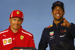 Kimi Raikkonen, Ferrari, and Daniel Ricciardo, Red Bull Racing, share a joke in the Thursday press conference