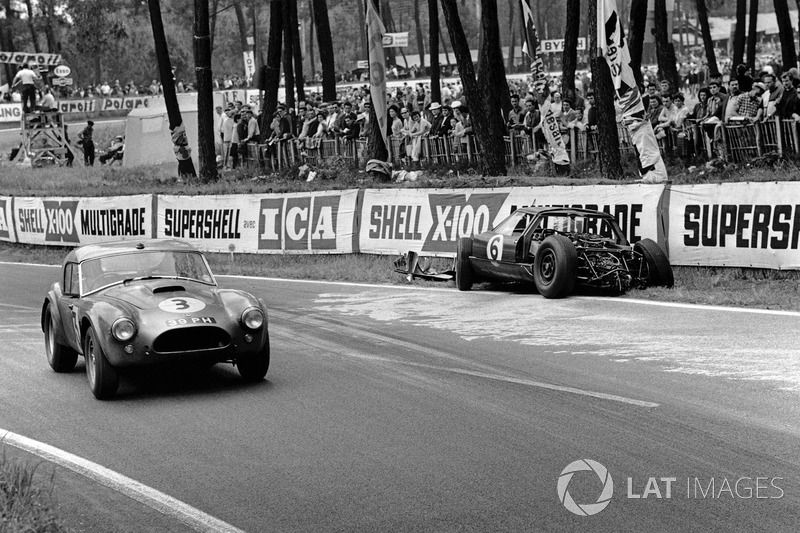 Peter Bolton, Ninian Sanderson, AC Cobra 289 Ford Coupe, passes the wreckage of Richard Attwood, Dav