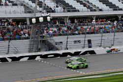 Checkered flag for #11 GRT Grasser Racing Team Lamborghini Huracan GT3: Rolf Ineichen, Mirko Bortolo