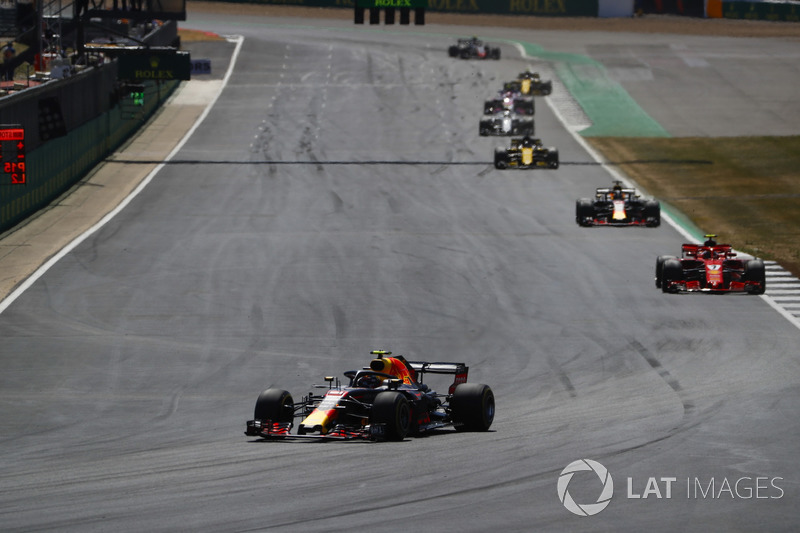 Max Verstappen, Red Bull Racing RB14, leads Daniel Ricciardo, Red Bull Racing RB14, and Kimi Raikkonen, Ferrari SF71H