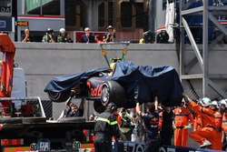 Marshals recover the crashed car of Max Verstappen, Red Bull Racing RB14