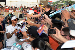 Lewis Hamilton, Mercedes AMG F1 signs autographs for the fans