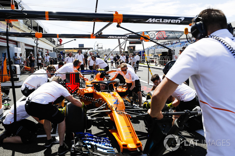 The McLaren team practise pit stops