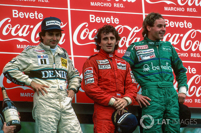 Podium : le vainqueur Alain Prost, le deuxième Nelson Piquet, le troisième Gerhard Berger