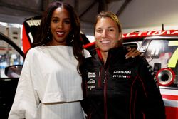 Former Destiny's Child singer Kelly Rowland chats with Simona de Silvestro, Nissan Motorsports