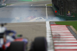 Charles Leclerc, Sauber C37 Ferrari, spins in front of a Toro Rosso