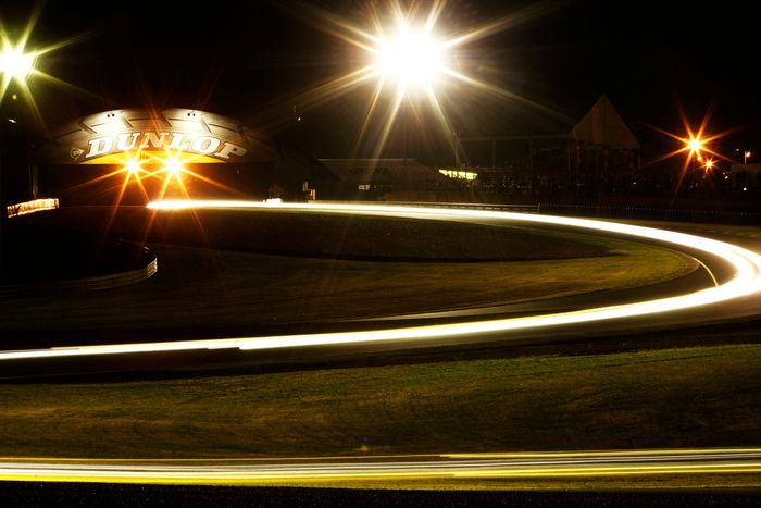 Light trails at night under the Dunlop bridge and through the Dunlop curves