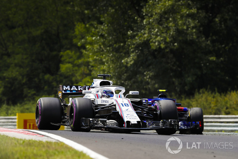 Lance Stroll, Williams FW41, leads Pierre Gasly, Toro Rosso STR13