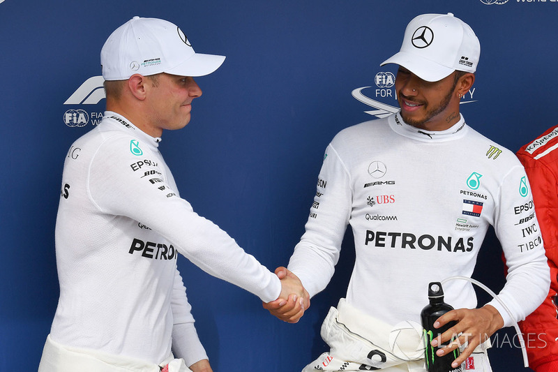 Valtteri Bottas, Mercedes-AMG F1, Lewis Hamilton, Mercedes-AMG F1 and Kimi Raikkonen, Ferrari celebrate in parc ferme