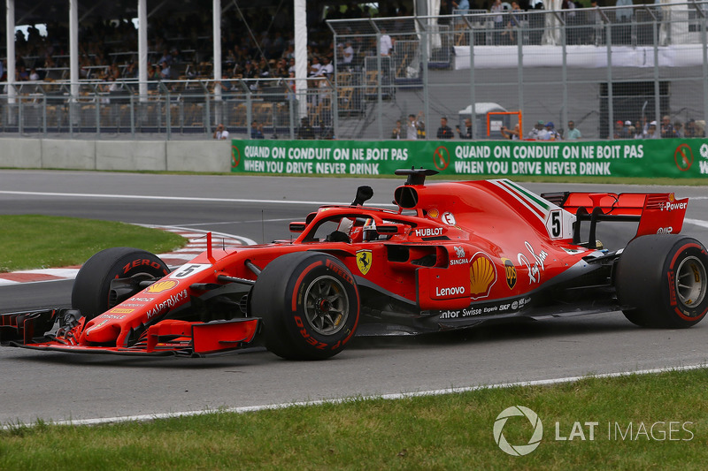 Race winner Sebastian Vettel, Ferrari SF71H waves at the end of the race