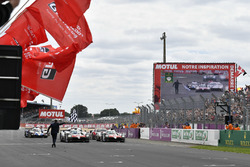 #8 Toyota Gazoo Racing Toyota TS050: Sébastien Buemi, Kazuki Nakajima, Fernando Alonso crosses he finish line with #7 Toyota Gazoo Racing Toyota TS050: Mike Conway, Kamui Kobayashi, Jose Maria Lopez at the checkered flag for the win