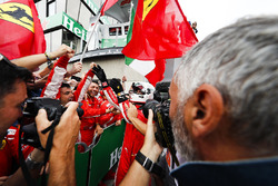 Sebastian Vettel, Ferrari, 1st position, celebrates with his team on arrival in Parc Ferme