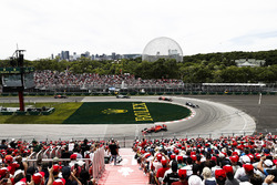 Sebastian Vettel, Ferrari SF71H, leads Valtteri Bottas, Mercedes AMG F1 W09, and Max Verstappen, Red