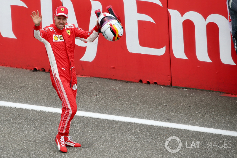 Pole sitter Sebastian Vettel, Ferrari celebrates in parc ferme