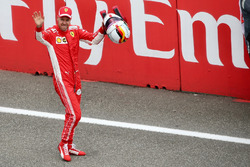Pole sitter Sebastian Vettel, Ferrari celebrates in parc ferme