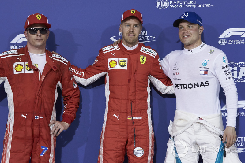 Sıralama turları ilk üç: Sebastian Vettel, Ferrari, Kimi Raikkonen, Ferrari, Valtteri Bottas, Mercedes AMG F1