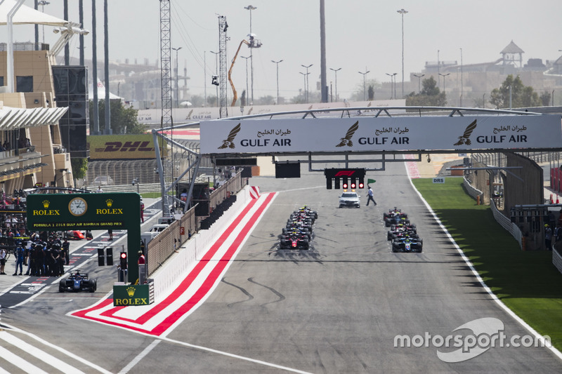 The drivers line up on the grid