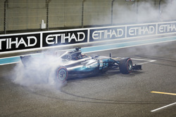 Second place Lewis Hamilton, Mercedes AMG F1, celebrate with doughnuts