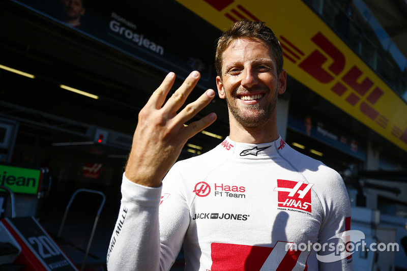 Romain Grosjean, Haas F1 Team, celebrates his fourth place