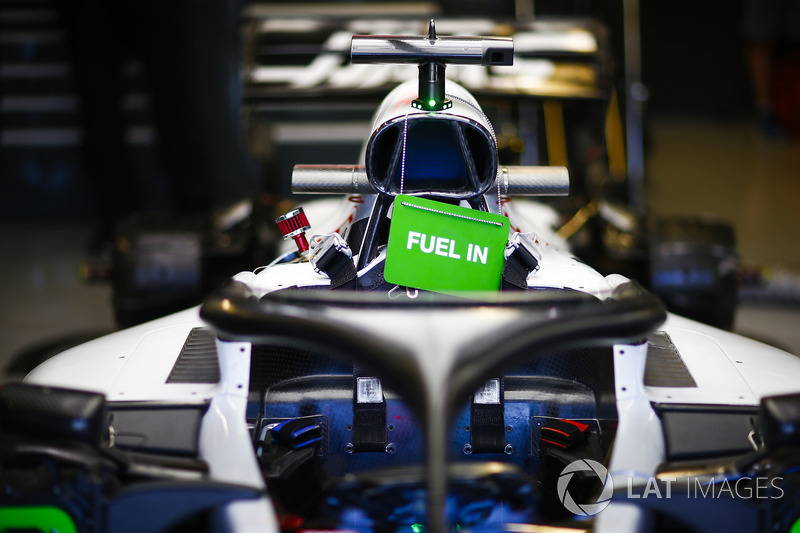 The fuelled up car of Romain Grosjean, Haas F1 Team VF-18, in the garage