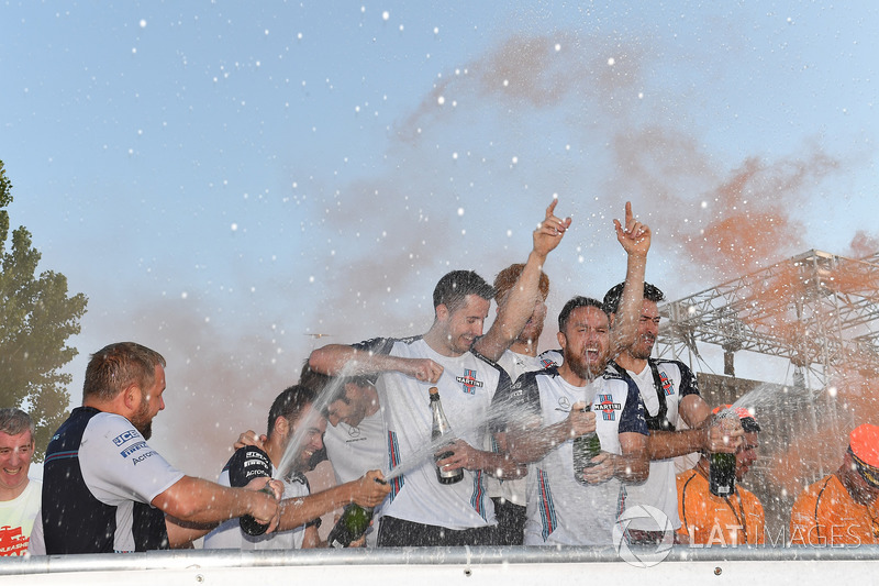 Williams celebrate on the podium at the raft race