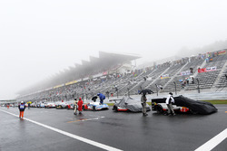 Cars lined up on the start/finish straight