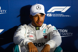 Lewis Hamilton, Mercedes AMG F1, relaxes after setting pole position