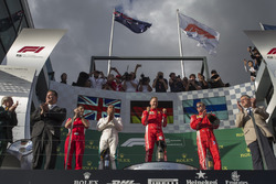 Lewis Hamilton, Mercedes-AMG F1, Sebastian Vettel, Ferrari and Kimi Raikkonen, Ferrari celebrate on the podium