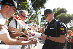 Max Verstappen, Red Bull Racing, signs autographs for fans