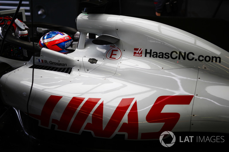 Romain Grosjean, Haas F1 Team VF-18 Ferrari, in the garage