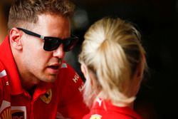 Sebastian Vettel, Ferrari, talking to his press officer