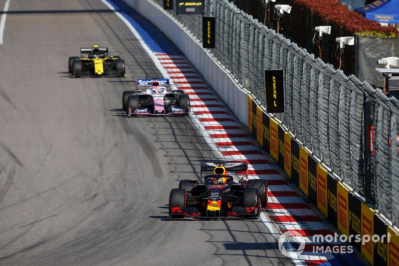 Max Verstappen, Red Bull Racing RB15, leads Sergio Perez, Racing Point RP19, and Nico Hulkenberg, Renault F1 Team R.S. 19