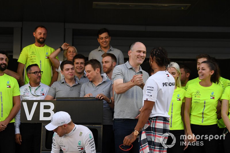 Valtteri Bottas, Mercedes AMG F1, 2nd position, and Lewis Hamilton, Mercedes AMG F1, 1st position, celebrate with their team