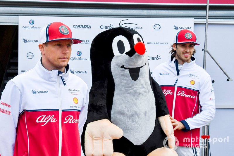 Kimi Raikkonen, Alfa Romeo Racing and Antonio Giovinazzi, Alfa Romeo Racing poses for a photograph with a mole