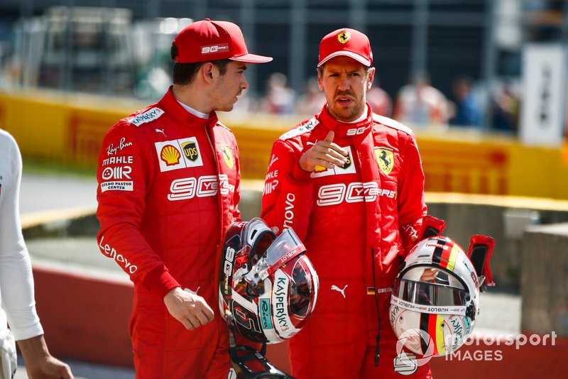 Charles Leclerc, Ferrari, with pole man Sebastian Vettel, Ferrari