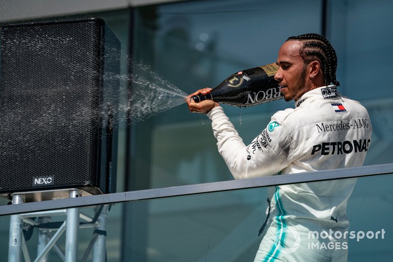 Lewis Hamilton, Mercedes AMG F1, 1st position, sprays Champagne on the podium