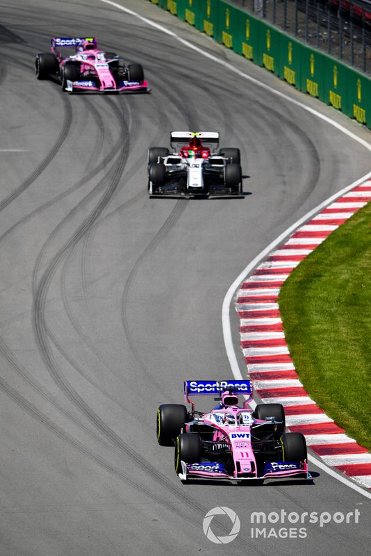 Sergio Perez, Racing Point RP19, leads Antonio Giovinazzi, Alfa Romeo Racing C38, and Lance Stroll, Racing Point RP19