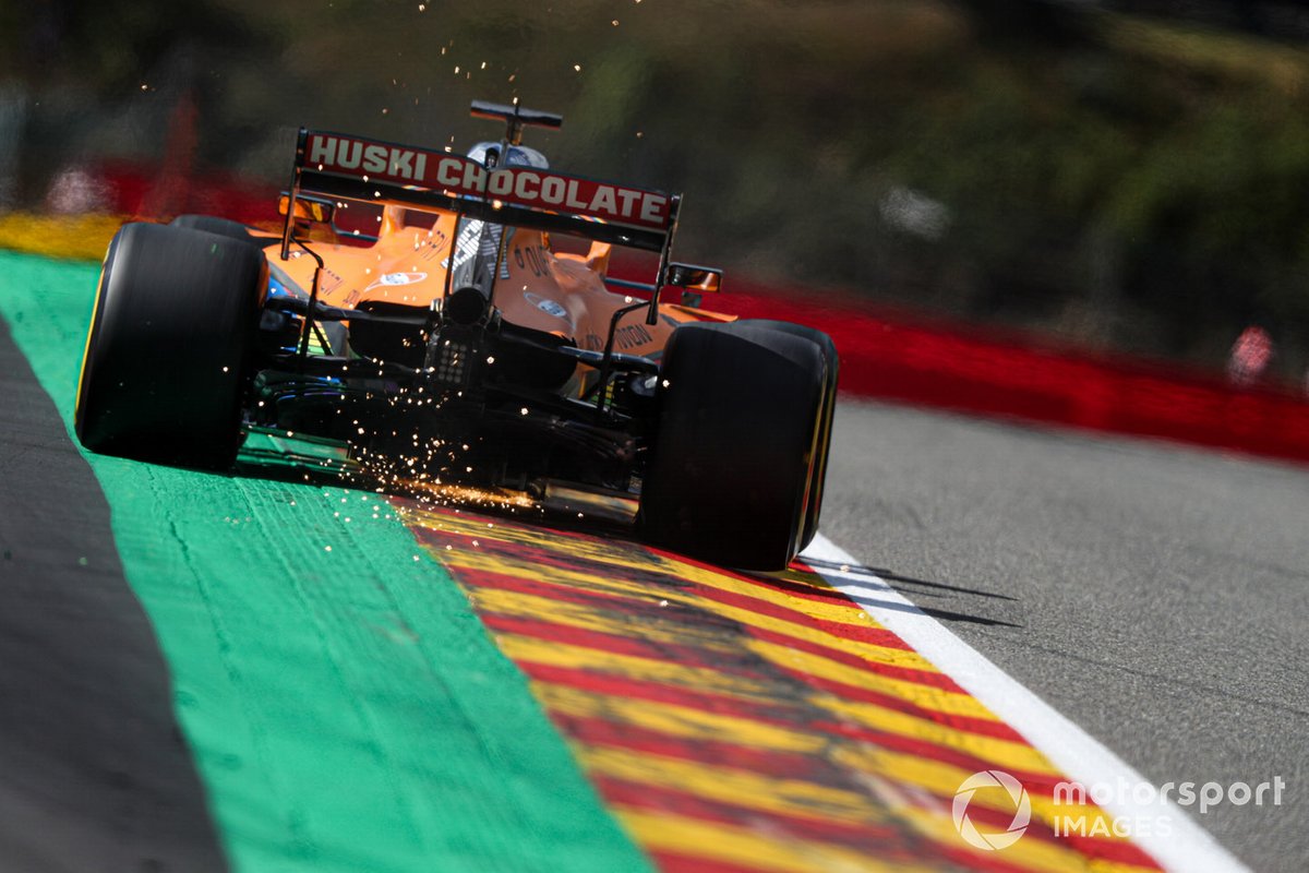 Carlos Sainz Jr., McLaren MCL35, kicks up some sparks