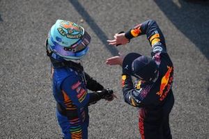 Daniel Ricciardo, McLaren, 3rd position, and Max Verstappen, Red Bull Racing, 2nd position, talk in Parc Ferme after Sprint Qualifying