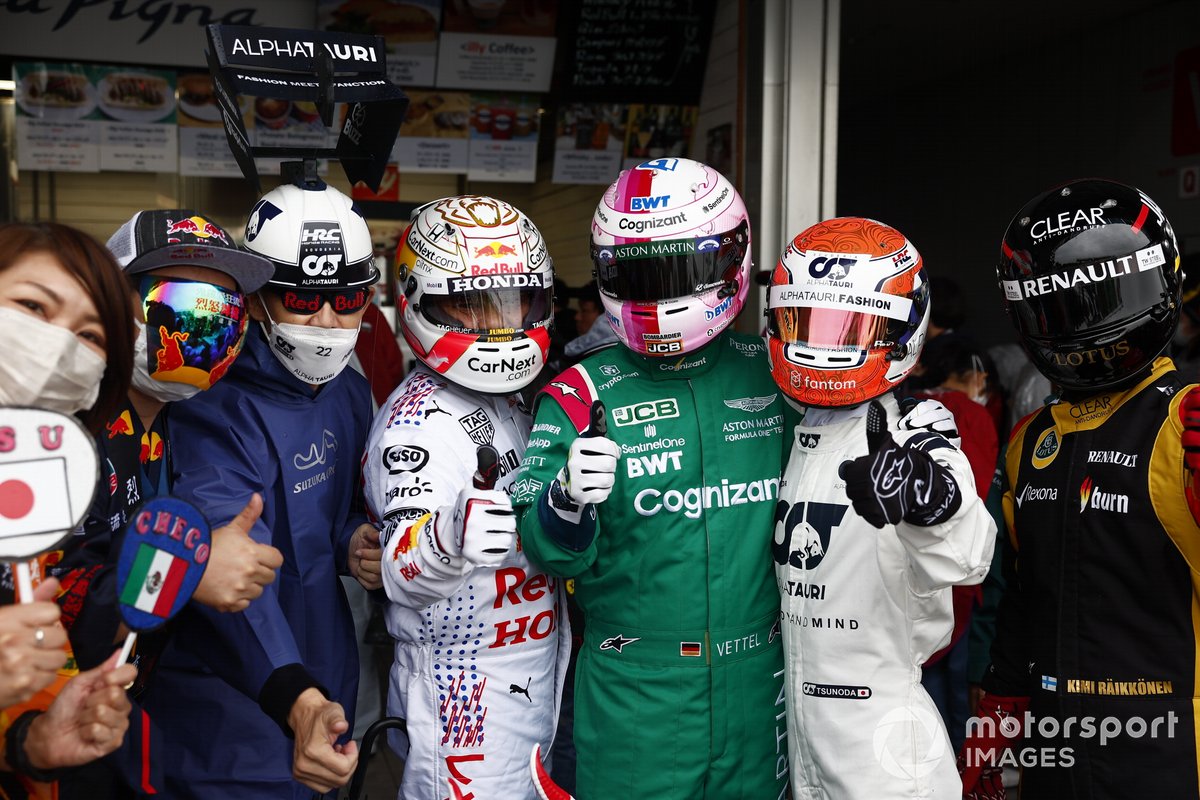 Fans dressed as drivers