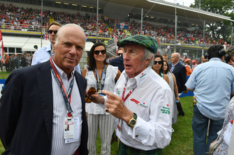 Jackie Stewart on the grid with Michel De Carvalho, former Olympic skier