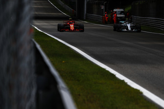 Kimi Raikkonen, Ferrari SF71H and Valtteri Bottas, Mercedes AMG F1 W09