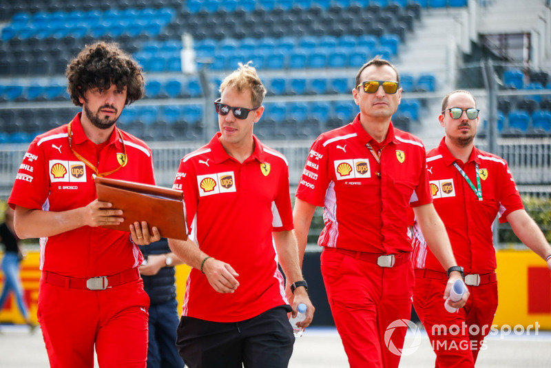 Sebastian Vettel, Ferrari, walks the track